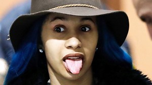 Cardi B gives Offset the middle finger while performing. https://bit.ly/2SHIIHP | Hollywood Life