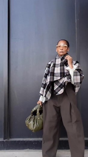 Salina Williams on Instagram: "Went through my October pics and saw this and wondered why I didn’t post and the more I looked at it the more it annoyed me🤣😂 But on this gloomy Fall day here we are and my bag from @gerarddarel. I might need to get the braids back! 🙄 Cape @Zara (oldish) Top @mango (last year - Victoria Beckham collab) Pant @zara Scarf @amazon Bag @gerarddarel"