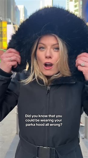 Inside Edition on Instagram: "This may come as a surprise, but there’s a good chance you are wearing the hood on your winter coat wrong. A hat trick posted on social media has gone viral. Jessica Alzamora is from Chicago and posted a video on how she wears her coat. Within 24 hours of posting the video, it had more than 5 million views. Our Alison Hall went to the crossroads of the world, Times Square, to show how to use your hood to stay warm. #winter #hack"