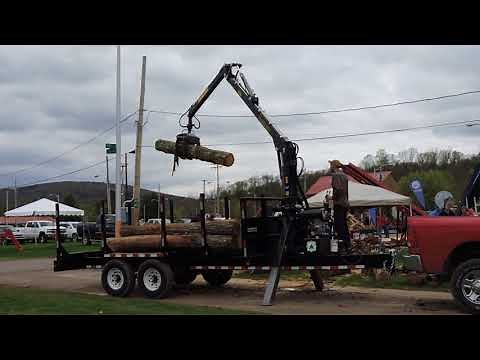 Palms (Hakmet) Log Loader on a ABS Log Trailer