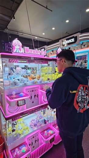 Claw machine fun at Max Fun Land, Brooklyn