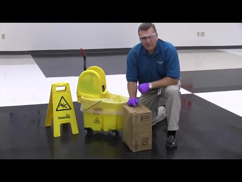 Applying Floor Finish using a mop and bucket
