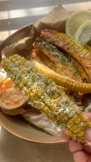 Arasnuur on Instagram: "Corn ribs recipe 🤍 Ingredients: 3 corn cobs 1 tsp paprika 1 tsp garlic powder 1 tsp black pepper 1 tsp parsley flakes (or fresh) 1 tsp salt 1/2 cup of butter (1 stick) Grated Parmesan (optional) Instructions: 1. Preheat the oven to 400 degrees. Begin by cutting the corn cob into 4 pieces (half then half). This part is somewhat difficult so make sure you have a strong stable knife. 2. Mix all of the seasonings into the melted butter and stir really well. 3. Add the corn i