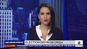 Georgians line up to vote in Senate runoff election