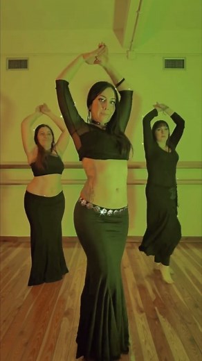 the Mesmerizing Belly Dance Artist - A captivating dancer whose every move embodies the essence of Arabic dance and the allure of Shakira-style performances. With graceful shimmy that evokes the rhythm of the desert, enticing belly rolls that ripple like waves, and magnetic belly flutters that leave spectators spellbound, this dancer creates an enchanting spectacle of sensuality and grace. From their alluring musically belly dance videos to captivating belly dance TikTok content, their passion f