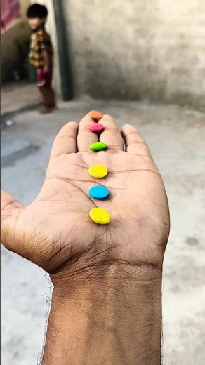 Cute baby Gems chocolate 🍭🍇🍑🥳🥭🍎🌽🍢🍡🍇🍓😹😛🍒🎉💕🍭🍑#viral #funny #chocolate #gems #trending #cutebaby