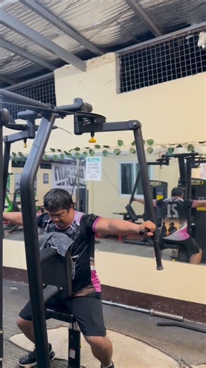 A rear delt fly machine is a gym machine used to strengthen the rear deltoid muscles in the shoulders, helping to improve shoulder stability and posture. T | Jerome Obsid