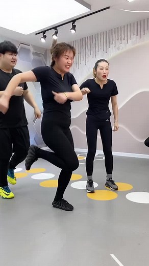 Coordinated Dance Routine in Modern Indoor Setting