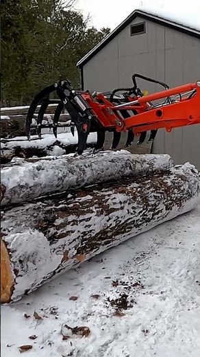 Grapple Stack Logs - Kubota Tractor