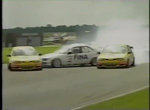 #24DaysOfSuperTouring Day 13: Renault team-mates Will Hoy & Alain Menu collide after getting involved with Joachim Winkelhock on lap 1 at Thruxton in 1996. #BTCC | 1990s BTCC