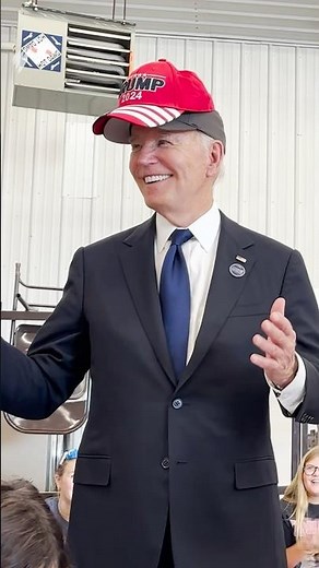 Joe Biden wears Trump hat and tells crowd not to eat dogs and cats