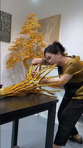 Challenge yourself to create home decorations using gold thread!