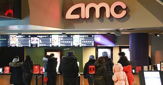 AMC frenzy triggers trading halts as stock surges 100 percent