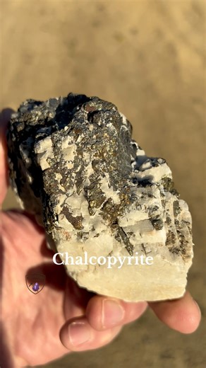 This chunk of chalcopyrite has a fun history to discover. It came from near Pikes Peak, Colorado which is known for the classic story of miners finding a for of pyrite and thinking it was truly gold! The white rock is called feldspar and it formed first but also with lead inclusions that made the light green splotches, which are known as amazonite. Over time, fluid with copper and iron crystalized on top and the chalcopyrite was formed. #collection #crystals #education #rocks #minerals #nature #
