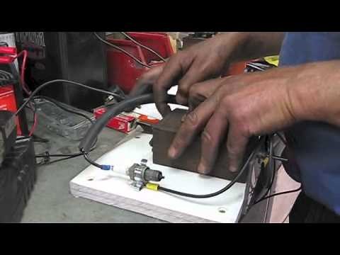 Testing Model T Ford trembler coils...