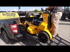 Carry a Lawn Mower in the Back of Your Truck with The Ramp Rack