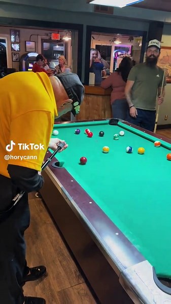 Old Man Hal's Pool Skills Shine at the Table
