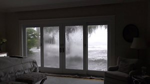 39K views · 105 reactions | There is not too many oceans around here but we do experience some flash floods! Check out this Andersen sliding glass door protect their home while the sea trys to get in! To learn more about Andersen Windows + Doors swing by one of our Design Center & Showrooms, where our specialists are always eager to help! | Meek's | Facebook