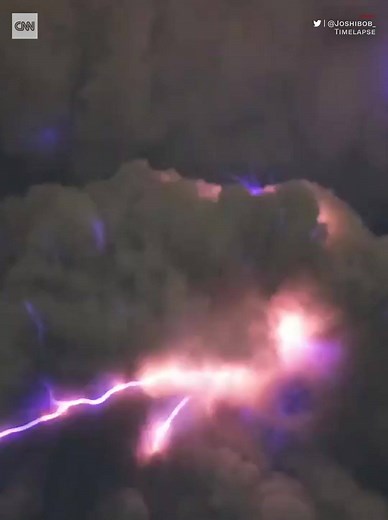 Dramatic video shows bolts of lightning as a volcano spews ash up to nine miles into the air in the Philippines. The country has raised the alert level, meaning an "explosive eruption" could happen in the coming hours or days: cnn.it/35OKfBK | CNN