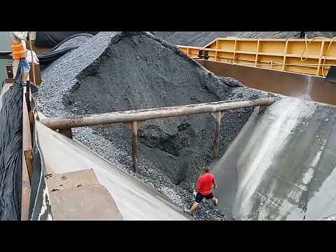 Barge unloading 3500 tons of coal! Hard work