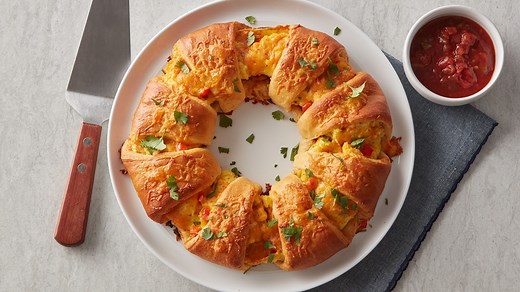 All your breakfast favorites - bacon, egg, cheese, flaky crescents - in one brunchable ring. Bacon, Egg and Cheese Brunch Ring recipe: https://www.pillsbury.com/recipes/bacon-egg-and-cheese-brunch-ring/fa0ee86d-a334-47d0-bb8b-8db43c7068fa?utm_source=facebook&utm_medium=social_organic&utm_campaign=MSP_XX?mktgimp=XX | Pillsbury