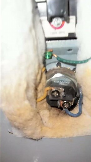 Replacing an electric hot water tanks, heating element part six