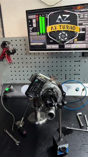 Turbocharger Installation Process in an Automotive Workshop