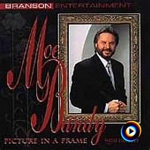 picture in a frame by Moe Bandy