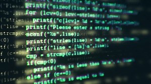 clip-12019793-programming-code-running-down-computer-screen-terminal
