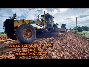 Motor Grader and Big Roller Grading and Compacting Along the High Slope of Embankment