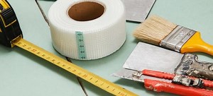 How to Apply Drywall Mesh Tape | DoItYourself.com