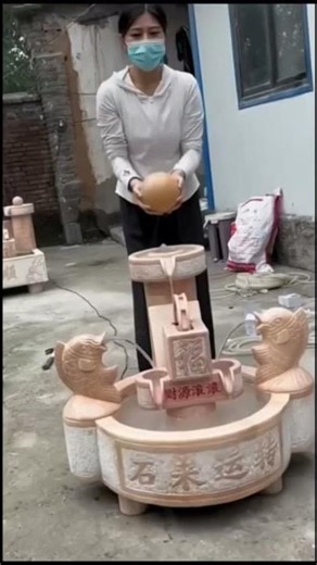 Installation process of rotating stone flowing water fountain