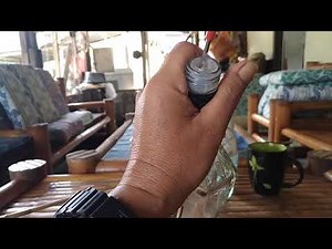 How to Open a Bottle Whiskey's Cap