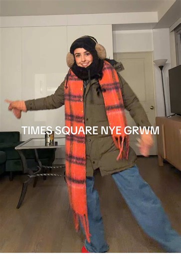 times square invite my friends and I to watch the ball drop on the red steps so obviously doing everything to not miss that @Times Square NYC double geesed & socked up First 2 Socks @Bombas Red scarf & gloves @Free People Jackets @CanadaGoose Ear mugs @Gap