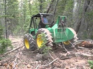 John Deere skidder 440 Extreme Logging