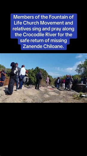 Members of the Fountain of Life Church Movement and relatives sing and pray along the Crocodile River for the safe return of missing Zanende Chiloane. #crocodile #missingperson