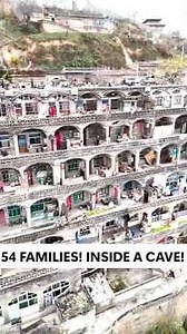 😱 54 Families Living Inside a Giant Cave Building in China!