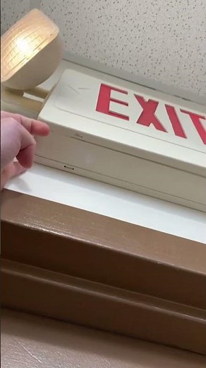 Testing an exit sign with incandescent emergency lights at a doctors office