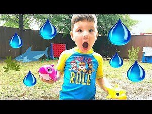 Rainy Day Fun For Kids Play Outside! Caleb & Mommy Play in The Rain with Baby Shark Toys!