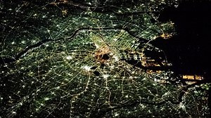 Night lights aerial satellite view animation on city of Tokyo, Japan. Contains image furnished by Nasa