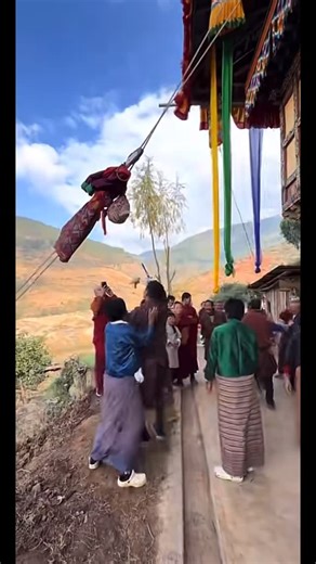 Land of Happiness on Instagram: "It is such an amazing culture, and I truly wish to experience it. The representation of the “House Lady” or “Nang ge Aum” is deeply symbolic. Although the house is built through the labor of men, by traditional custom the ownership belongs to the woman. According to oral history shared by elders, the act of men trying to catch her or snatch the mannequin’s bag symbolizes men desiring the woman along with her wealth or status. At the same time, her friends and rel
