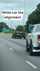 Straight White car tire alignment | Roadside America