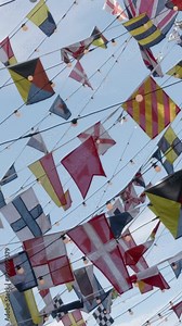 Ship signal flags. Array of nautical flags used to send messages between ships.