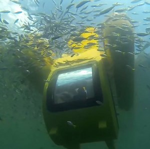 This boat comes with a built-in submarine. | Transportation Insider