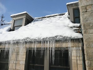 Ice Dams: What They Are, How They Form, & How To Remove