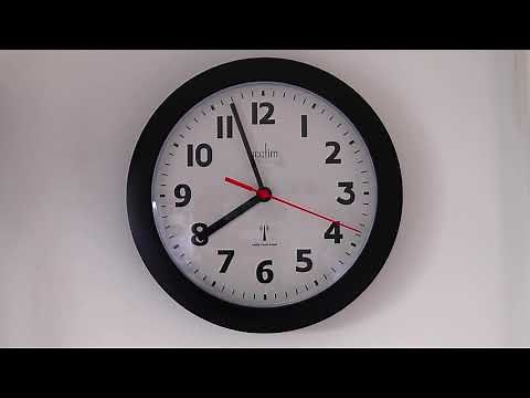 Time lapse of a Clock Turning Clockwise Stock Footage | Wall Clock Video | Royalty Free