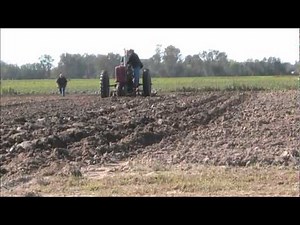 Farmall Super C Discing field