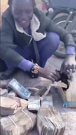 Bandits Boldly Flaunt Bundles Of Naira They Got From Ransom In The Forest