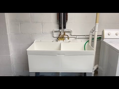 How I replaced a utility sink and added a washing machine standpipe.