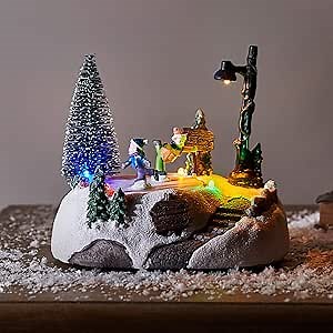Lights4fun, Inc. Christmas Village Ice Skating Pond Animated Pre-Lit Multicolored LED Battery Operated Light Up Holiday Decoration